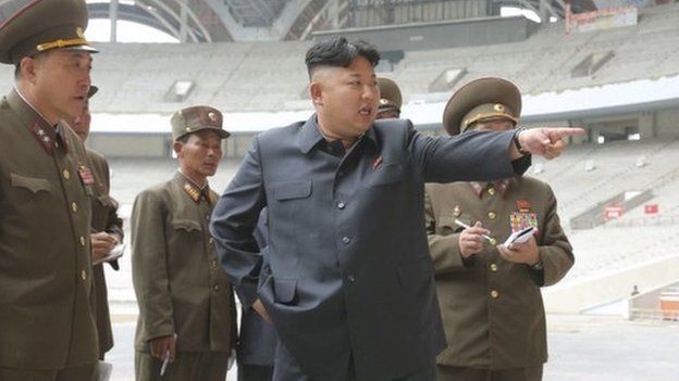 North Korean leader Kim Jong-un gives field guidance to the remodelling site of the May Day Stadium in this undated photo released by North Korea's Korean Central News Agency in Pyongyang on 20 June 2014.