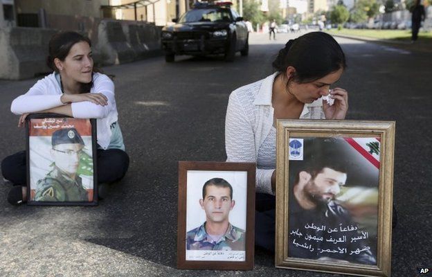 Relatives of Lebanese soldiers captured by Islamic State and al-Nusra Front at a demonstration in Beirut demanding the Lebanese authorities take action to secure their release (22 October 2014)