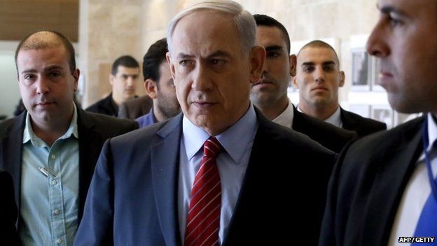 Surrounded by bodyguards, Israeli Prime Minister Benjamin Netanyahu, arrives to the Likud faction meeting at the Knesset in December 2014