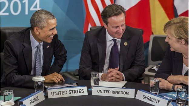 U.S. President Barack Obama and Britain"s Prime Minister David Cameron listen to Germany"s Chancellor Angela Merkel as they attend the Transatlantic Trade and Investment Partnership (TTIP) meeting at the G20 the G-20 leaders summit in Brisbane, Australia, Sunday, Nov. 16, 2014.