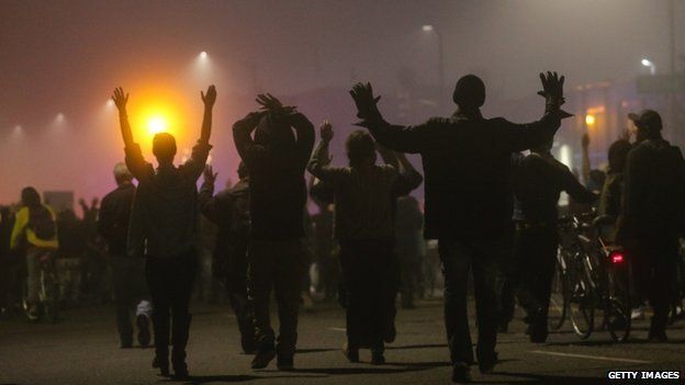 Protesters walked through fog in East Oakland, California, on 4 December 2014
