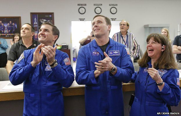 Astronauts watching the landing