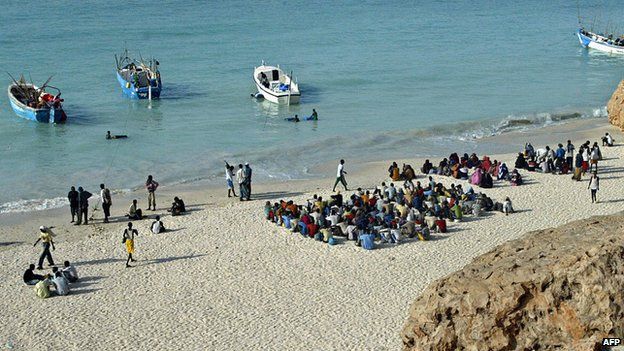 File photo: Illegal Somali and Ethiopian migrants wait to embark on boats on a voyage to Yemen on Shinbivale beach, 17 kms, east of Bosasso, Somalia, 7 September 2007