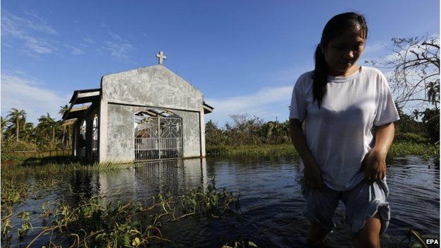 Ruined church amid flooding in Dolores, Philippines (8 Dec 2014)