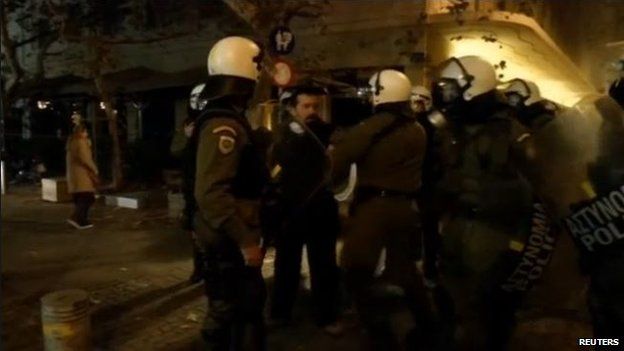 Reuters video footage of policeman assaulting a protester 6 December 2014