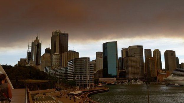 Smoke and ash from wildfires burning across the state of New South Wales blankets the Sydney city skyline. Photo: October 2013
