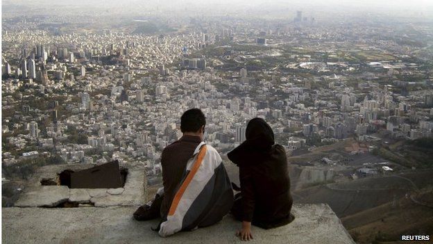 Iranian couple overlooking Tehran (file photo)