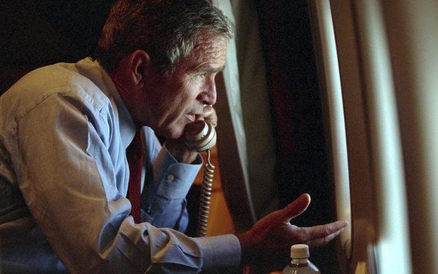 US President George W Bush speaks to Vice President Dick Cheney by phone aboard Air Force One in 2001