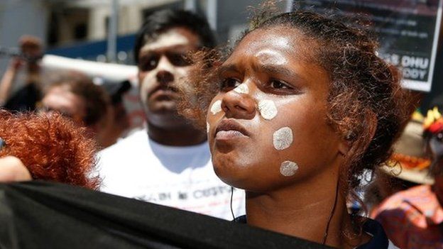 A woman attends a march to protest for aboriginal rights. Photo: November 2014