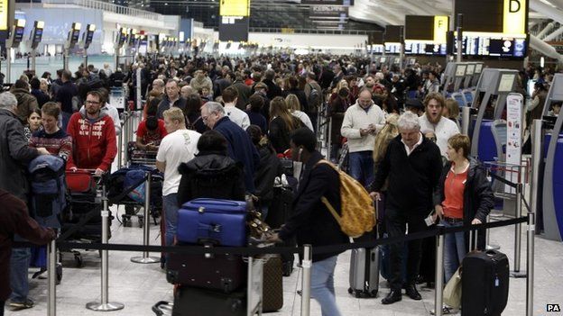Passengers waiting at Heathrow