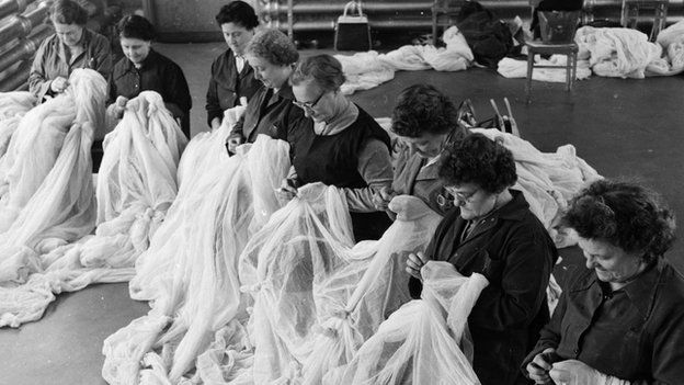 Checking lace in a factory, 1959
