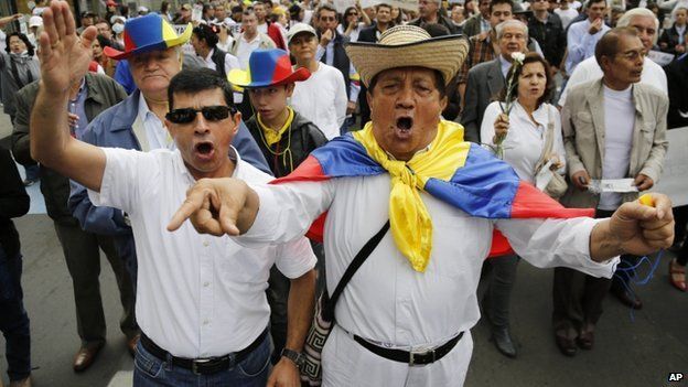 Anti government peace talks march Bogota Dec. 13, 2014.