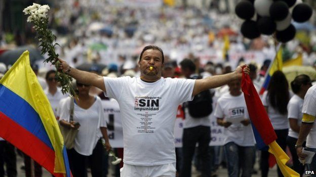 Cali, Colombia, during a demonstration against the alleged impunity at the peace talks negotiations held in Havana (Cuba), between Colombian Government and Farc guerrilla. 13 Dec 2014