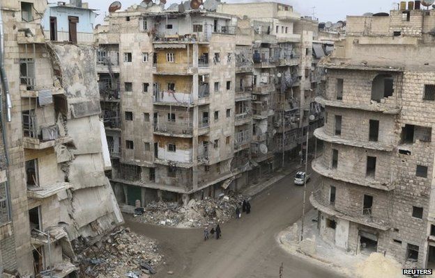 War-damaged buildings in Aleppo's al-Shaar district (10 December 2014)