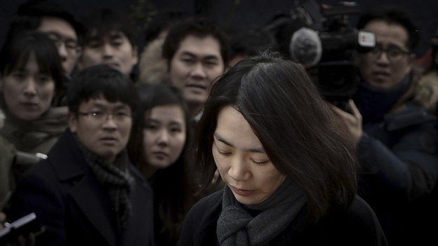 Cho Hyun-ah, also known as Heather Cho, daughter of chairman of Korean Air Lines, Cho Yang-ho, appears in front of the media outside the offices of the Aviation and Railway Accident Investigation Board of the Ministry of Land, Infrastructure, Transport, in Seoul December 12, 2014.