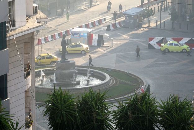 Checkpoints and road blocks in Yusuf al-Azma Square