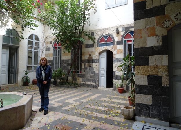Diana Darke in the courtyard of her house