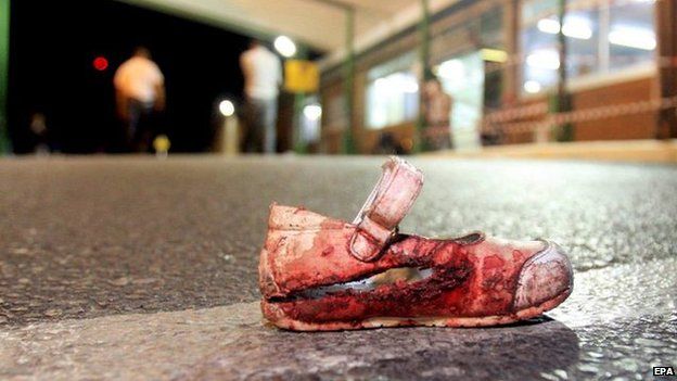 Bloody shoe on ground
