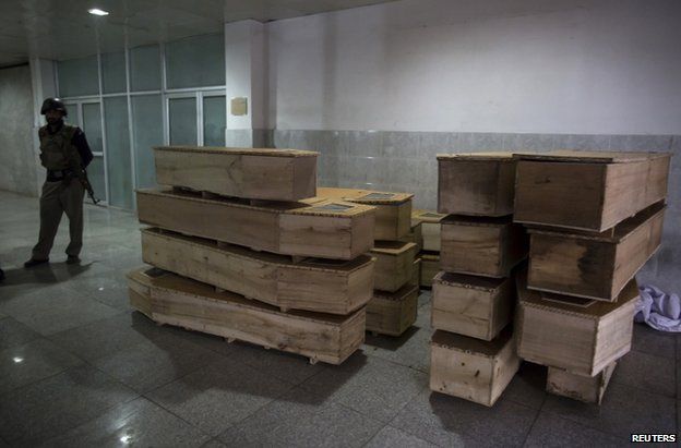 Empty coffins stacked at a hospital in Peshawar, 16 December