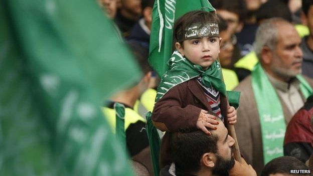 A Palestinian boy at a Hamas rally in the Gaza Strip (12 December 2014)
