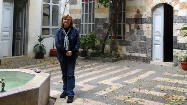 Diana Darke in the courtyard of her house