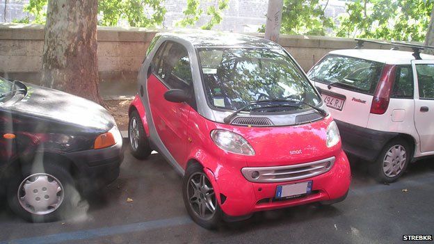 Smart car parked perpendicular