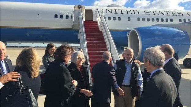 Image from Twitter of Alan Gross disembarking from plane. 17 December 2014