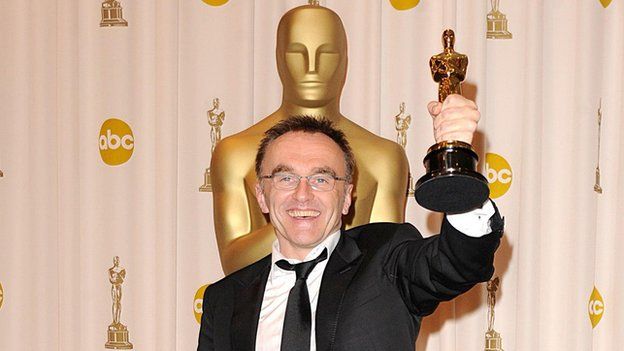 Danny Boyle poses with the Best Director Oscar for Slumdog Millionaire in 2009