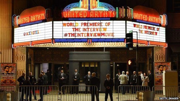 Security is seen outside The Theatre at Ace Hotel before the premiere of the film "The Interview" in Los Angeles, California on December 11, 2014.