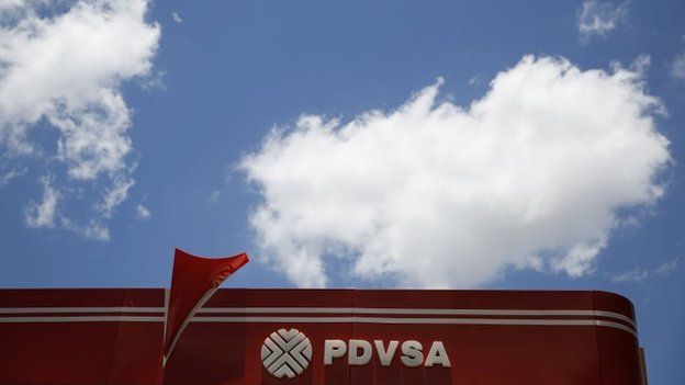 The PDVSA logo is seen at its gas station in Caracas in this 29 August, 2014 file photo