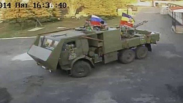 CCTV image of men in an armoured truck