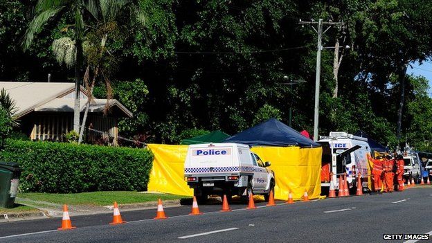 Police attend the scene of multiple deaths in the suburb of Manoora on 19 December 2014 in Cairns, Australia