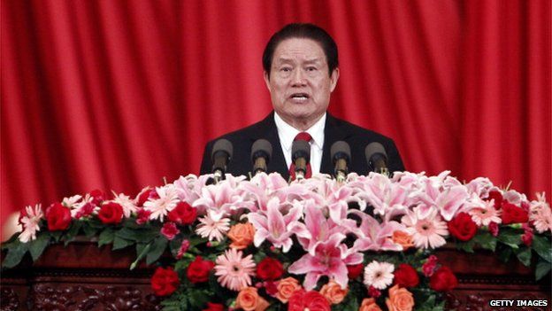 This picture taken on 18 May, 2012 shows then-Politburo standing committee member, secretary of the central political and law commission, Zhou Yongkang, delivering a speech at a meeting in Beijing