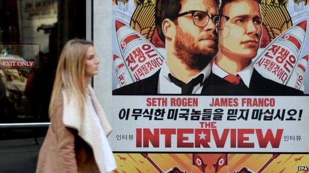 Poster for the film The Interview outside of Regal Theatre in New York, 18 Dec
