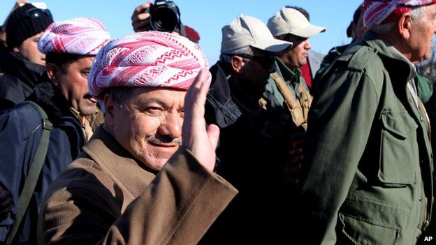 Kurdistan Iraqi regional government President Massoud Barzani arrives to support Kurdish forces as they head to battle Islamic State militants, on the summit of Mount Sinjar, in the town of Sinjar, Iraq, Sunday, Dec. 21, 2014.