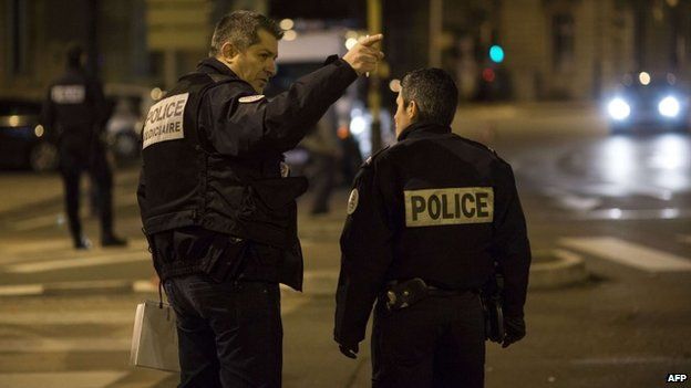 Police at the site where a driver targeted pedestrians in Dijon