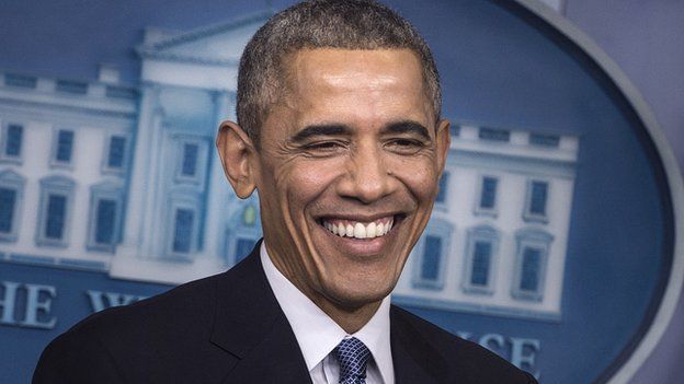 President Barack Obama smiles.