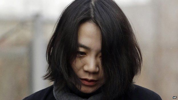 In this Dec. 12, 2014 file photo, Cho Hyun-ah, who was head of cabin service at Korean Air and the oldest child of Korean Air Chairman Cho Yang-ho, speaks to the media upon her arrival for questioning at the Aviation and Railway Accident Investigation Board office of Ministry of Land, Infrastructure and Transport in Seoul, South Korea