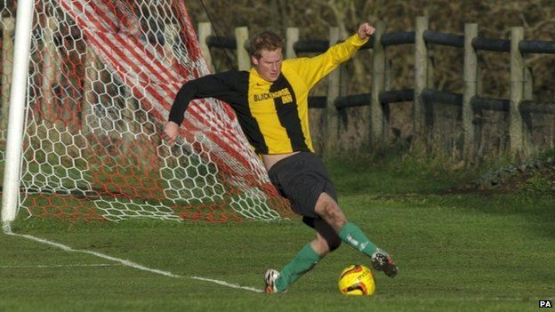 Prince Harry in Christmas Eve football match - BBC News