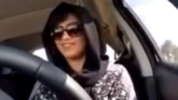 Loujain al-Hathloul at wheel of her car