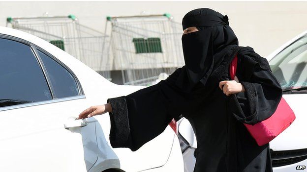 Saudi woman entering car