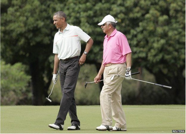 Obama and Razak playing golf on Christmas eve 2014