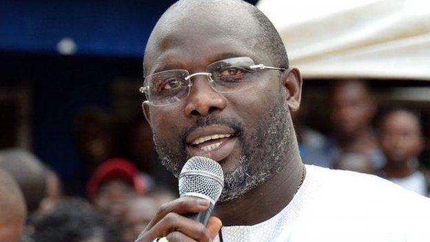 George Weah speaking at a campaign rally in Liberia