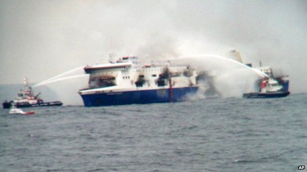 Vessels try to extinguish the fire at the Italian-flagged Norman Atlantic after it caught fire in the Adriatic Sea, on 28 December 2014
