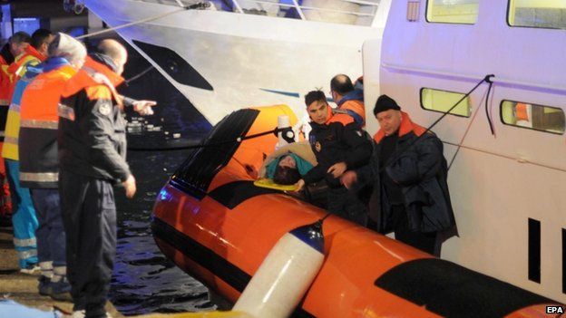 Rescue operations evacuating some of passengers from the Norman Atlantic ferry on a "Capitaneria di Porto" patrol boat in the harbour of Otranto, Italy, 28 December 2014.