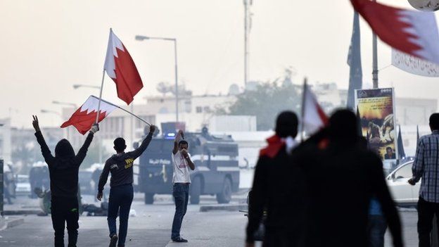 Shia youths protest against the detention of Wefaq leader Sheikh Ali Salman in the village of Bilad al-Qadim, Bahrain (29 December 2014)