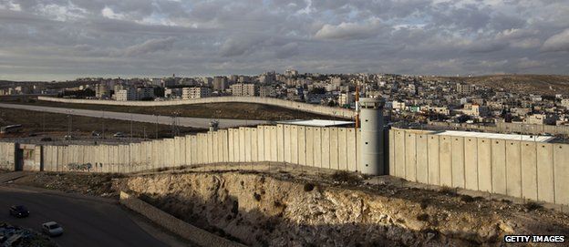 A general view shows a section of Israel's separation barrier in the West Bank village of Al-Ram on the outskirts of Jerusalem in December 2012