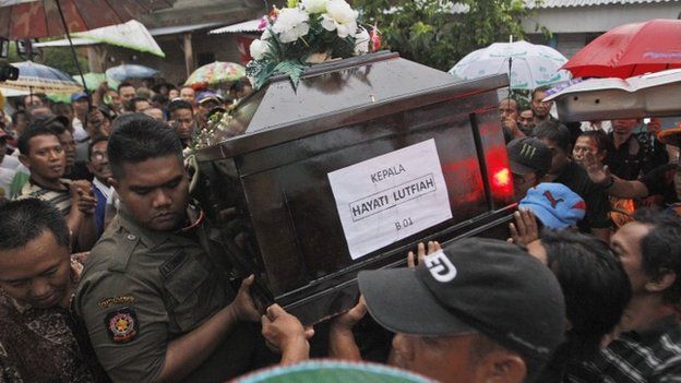 The funeral of Air Asia crash victim, Hayati Lutfiah Hamid, Surabaya, east Java, 1 January 2015