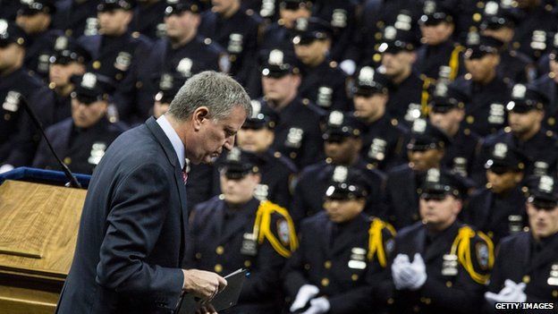 New York Mayor Bill de Blasio addresses new police academy graduates.