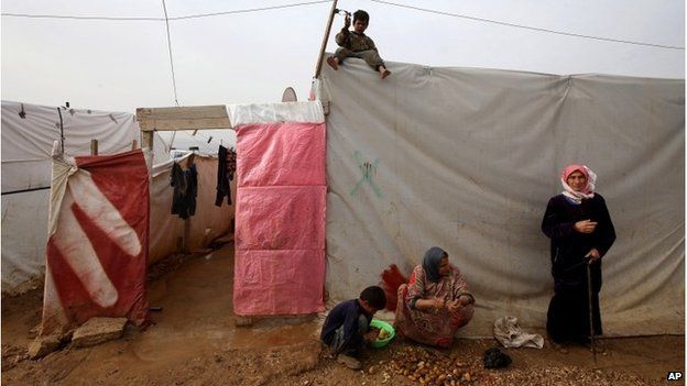 Syrian refugees at a camp in eastern Lebanon, December 2014